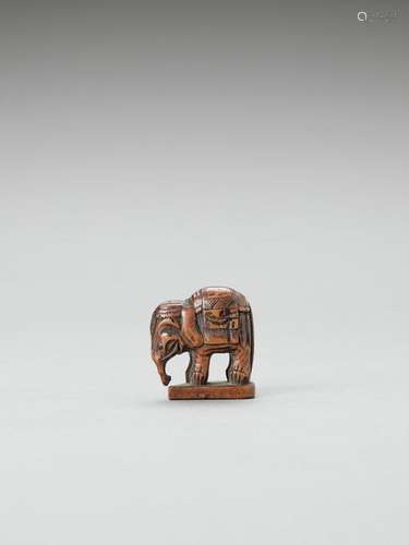 A Wood Netsuke Of A Caparisone…