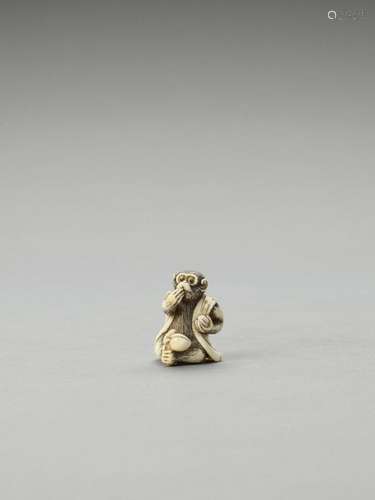 An Ivory Netsuke Of A Monkey E…