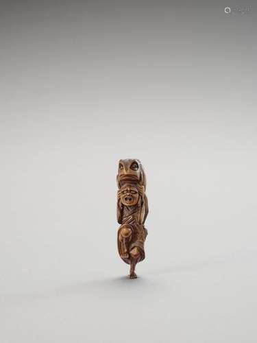 A Tall Wood Netsuke Of Gama Se…