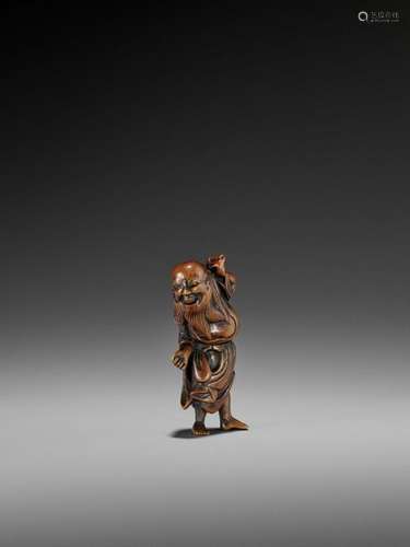 A Wood Netsuke Of A Sage