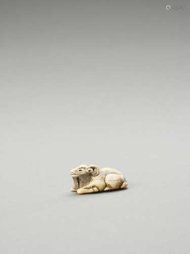 An Ivory Netsuke Of A Recumben…