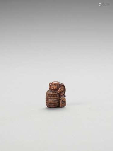 A Wood Netsuke Of Fukusuke Wit…