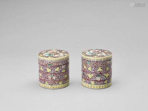 A Pair Of Three Tiered Enamele…