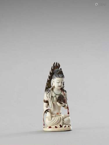 An Ivory Figure Of Guanyin, La…