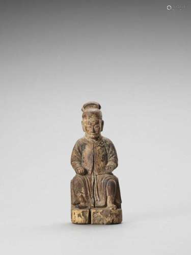 A Wood Figure Of A Dignitary, …
