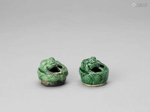 A Pair Of Emerald Green Glazed…