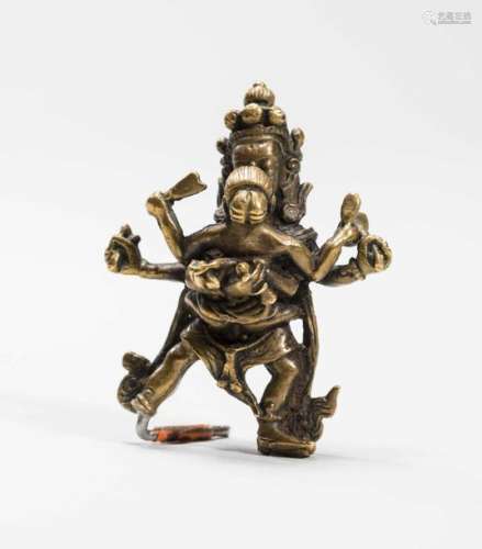 A Tibetan Bronze Of A Dharmapa…