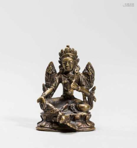 A Tibetan Miniature Bronze Of …