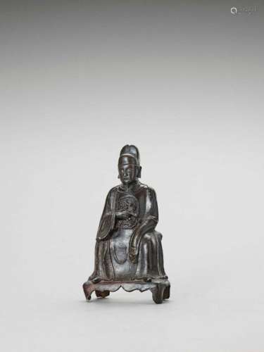 A Bronze Figure Of A Daoist Sc…