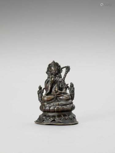 A Nepalese Bronze Figure Of Pa…