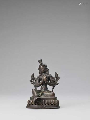 A Nepalese Bronze Figure Of Gr…