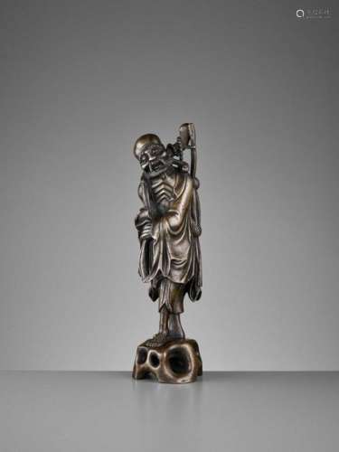 A Bronze Figure Of An Emaciate…