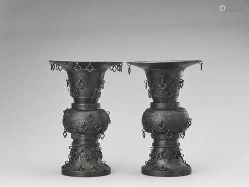 A Pair Of Metal Alloy Archaist…