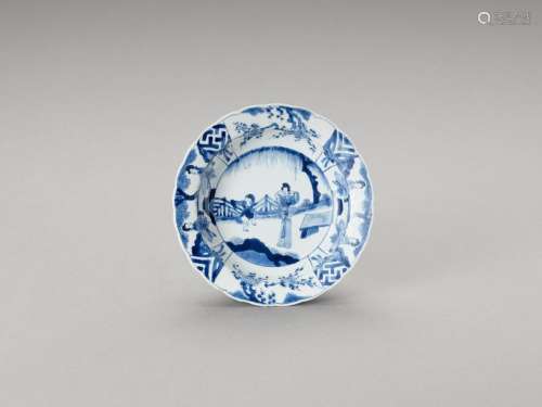 A Lobed Blue And White Porcela…