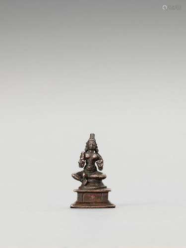 A Chola Style Miniature Bronze…