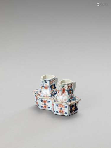 A Pair Of Imari Porcelain Jugs…