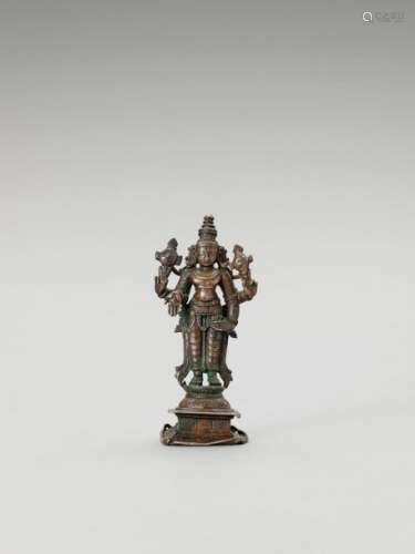 A Chola Style Miniature Bronze…