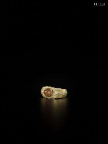 A Gold Ring With A Carnelian, …