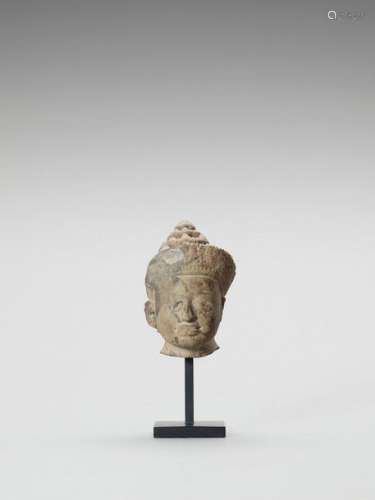 A Khmer Sandstone Head Of Vish…