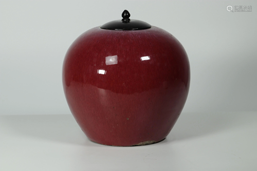 Round ox blood vase with wooden cover