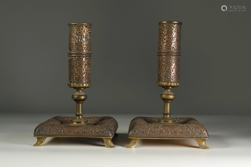 Pair of Qadjar period copper candlesticks, Iran circa