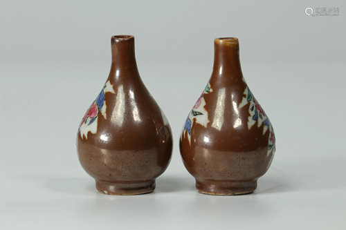 China pair of miniature vases with capuchin bottom -