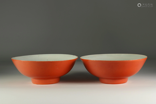 Pair of monochrome porcelain bowls with marked coral