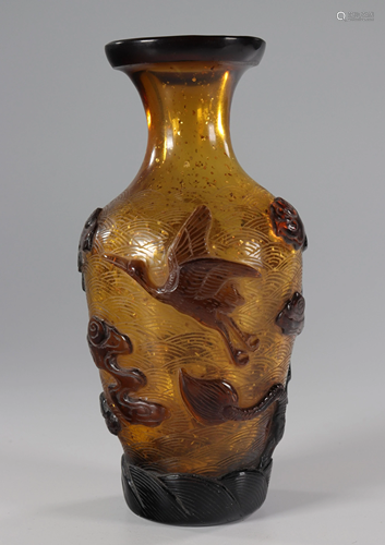 Pekin glass vase decorated with characters.