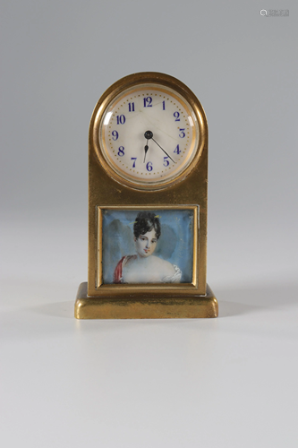 Miniature clock decorated with a painted young woman