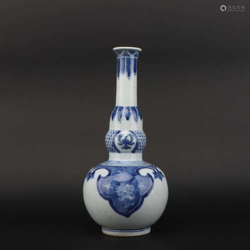 A blue and white 'flowers' vase