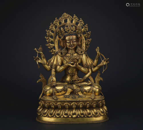 A gilt-bronze figure of Ushnisha Vijaya