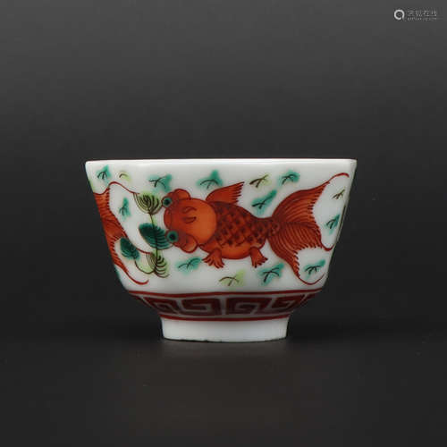 A allite red glazed 'fish' cup