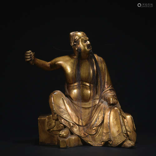 A gilt-bronze statue of Guangong