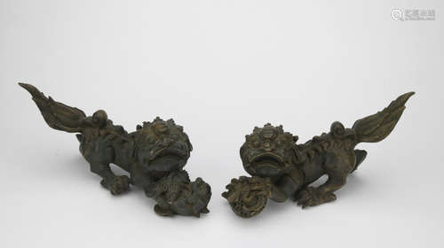 A pair of bronze lion