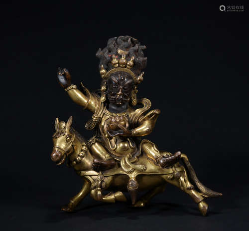 A gilt-bronze figure of Pelden Lhamo