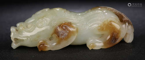 A HETIAN JADE BEAST PENDANT