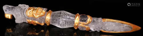 A CRYSTAL VAJRA EMBEDDED WITH GOLD