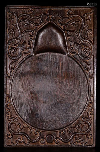 A CHENXIANG WOOD INK SLAB CARVED WITH POETRY