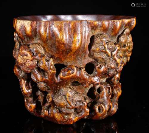 A CHENXIANG WOOD CUP CARVED WITH PLUM FLOWER