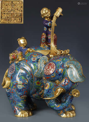 A CLOISONNE FIGURE AND ELEPHANT