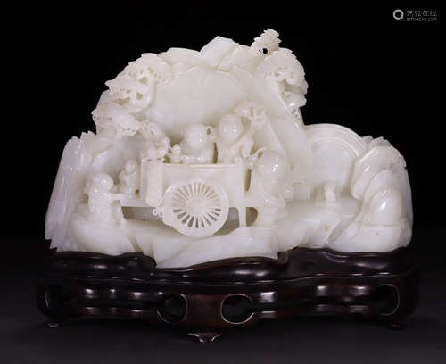 A HETIAN JADE ORNAMENT CARVED WITH FIGURE