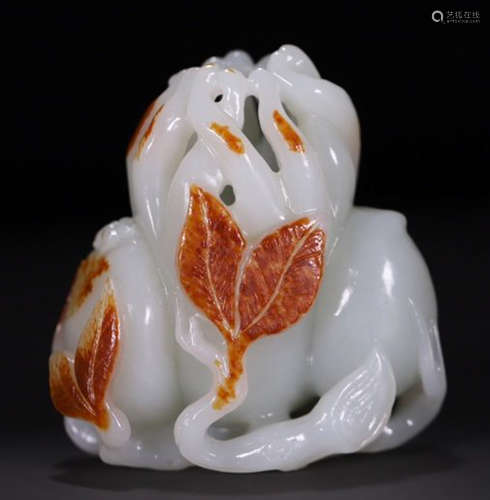 A HETIAN JADE PENDANT SHAPED WITH CHAYOTE