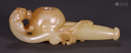 A HETIAN JADE PENDANT CARVED WITH BEAST