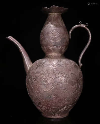 A SILVER POT CARVED WITH DRAGON