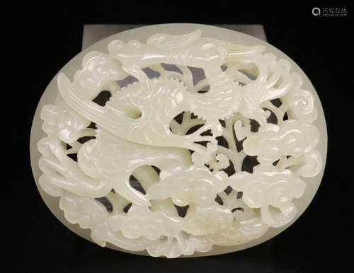 A HETIAN JADE PENDANT HOLLOW CARVED WITH BEAST