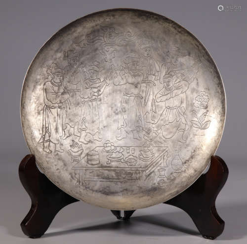 A SILVER PLATE CARVED WITH STORY