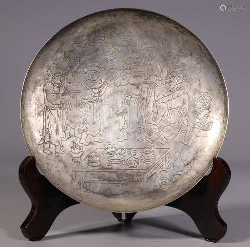 A SILVER PLATE CARVED WITH STORY