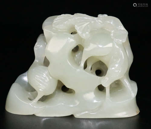 A HETIAN JADE PENDANT CARVED WITH DEER