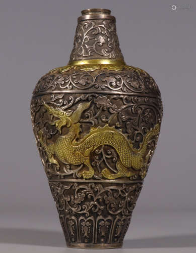 A GILT SILVER VASE CARVED WITH FLOWERS AND DRAGON