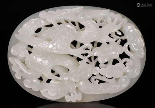 A HETIAN JADE PENDANT HOLLOW CARVED WITH BEAST